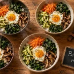 Bibimbap maison cuisine coreenne recettes : légumes, œuf et sauce gochujang